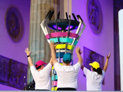 25 June 2023, Berlin: The Olympic flame goes out during the closing ceremony of the Special Olympics World Games in Berlin. Photo: Jean-Marc Wiesner/dpa