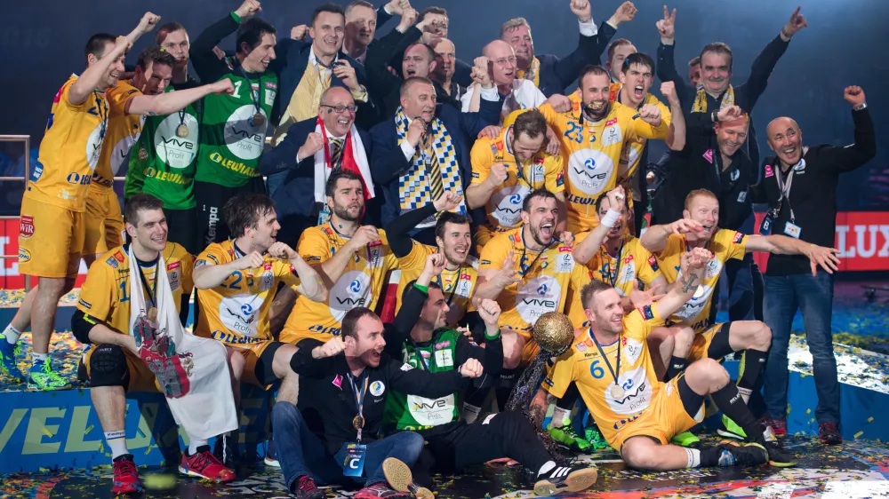 ﻿In this Sunday, May 29, 2016 photo the team of Kielce celebrate after winning the Handball Champions League EHF Final Four final between KS Vive Kielce and MKB Veszprem in Cologen, western Germany. (Marius Becker/dpa via AP)