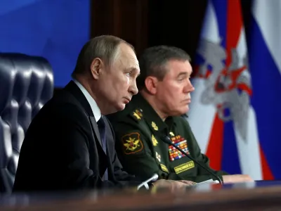 FILE PHOTO: Russian President Vladimir Putin and Chief of the General Staff of Russian Armed Forces Valery Gerasimov attend an annual meeting of the Defence Ministry Board in Moscow, Russia, December 21, 2022. Sputnik/Mikhail Kuravlev/Kremlin via REUTERS ATTENTION EDITORS - THIS IMAGE WAS PROVIDED BY A THIRD PARTY./File Photo