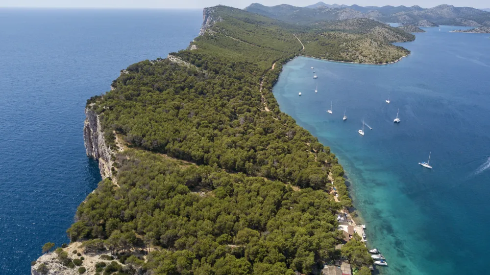 Aerial view of the island of Dugi Otok in front of the city of Zadar, Croatia. Coastline. Cliff overlooking the sea and lagoon.