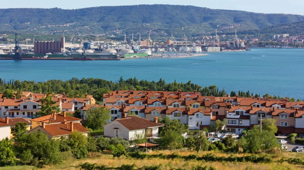 Seaside resort of Ankaran, Slovenia, with the seaport of Koper in the background