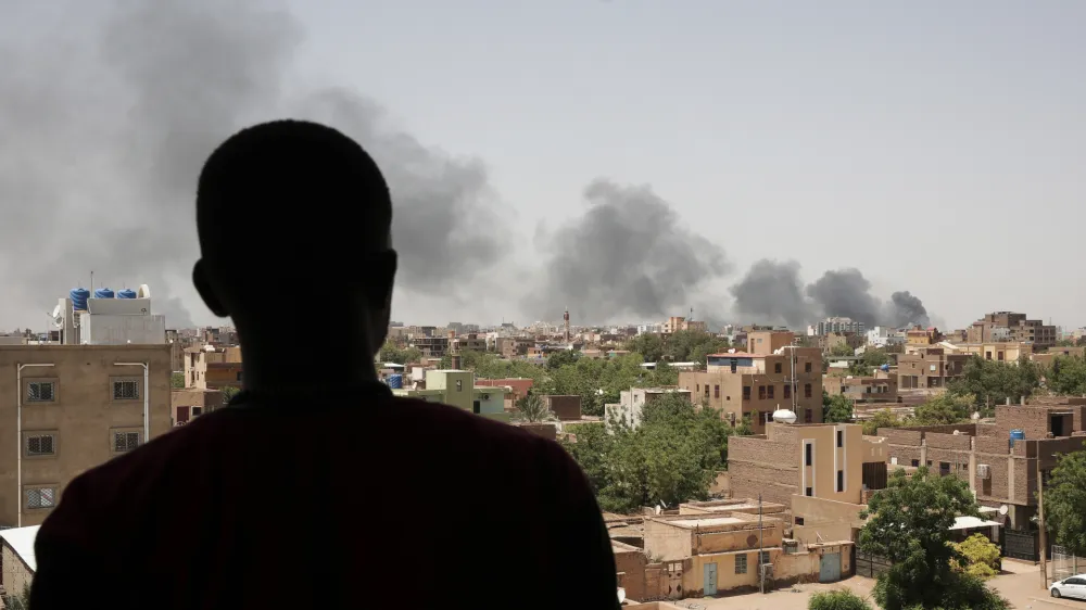 Smoke is seen in Khartoum, Sudan, Saturday, April 22, 2023. The fighting in the capital between the Sudanese Army and Rapid Support Forces resumed after an internationally brokered cease-fire failed. (AP Photo/Marwan Ali)