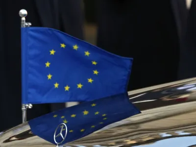 FILE - The European flag is seen on the car of European Council President Charles Michel on his arrival for a meeting with French President Emmanuel Macron at the Elysee Palace, in Paris, France, Tuesday, Jan. 11, 2022. The European Union has moved closer to a clinching a deal over transatlantic data transfers aimed at resolving concerns about U.S. spying with a draft decision that confirms "comparable safeguards" to those in the EU, which has stringent privacy rules. (AP Photo/Francois Mori, FILE)