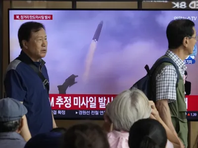 A TV screen shows a file image of North Korea's missile launch during a news program at the Seoul Railway Station in Seoul, South Korea, Wednesday, July 12, 2023. North Korea launched a long-range ballistic missile toward its eastern waters Wednesday, its neighbors said, two days after the North threatened "shocking" consequences to protest what it called a provocative U.S. reconnaissance activity near its territory. (AP Photo/Ahn Young-joon)