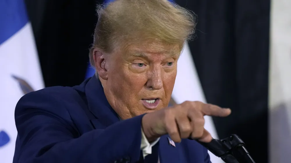 CORRECTS CITY AND LOCATION - Former President Donald Trump speaks to campaign volunteers at the Elks Lodge, Tuesday, July 18, 2023, in Cedar Rapids, Iowa. (AP Photo/Charlie Neibergall)