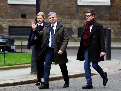 FILE PHOTO: Vadym Prystaiko, who has been dismissed as Ukraine's ambassador to Britain, waves as he and his wife Inna Prystaiko walk outside Number 10 Downing Street on the first anniversary of Russia's full-scale invasion of Ukraine, in London, Britain, February 24, 2023. REUTERS/Peter Nicholls/File Photo