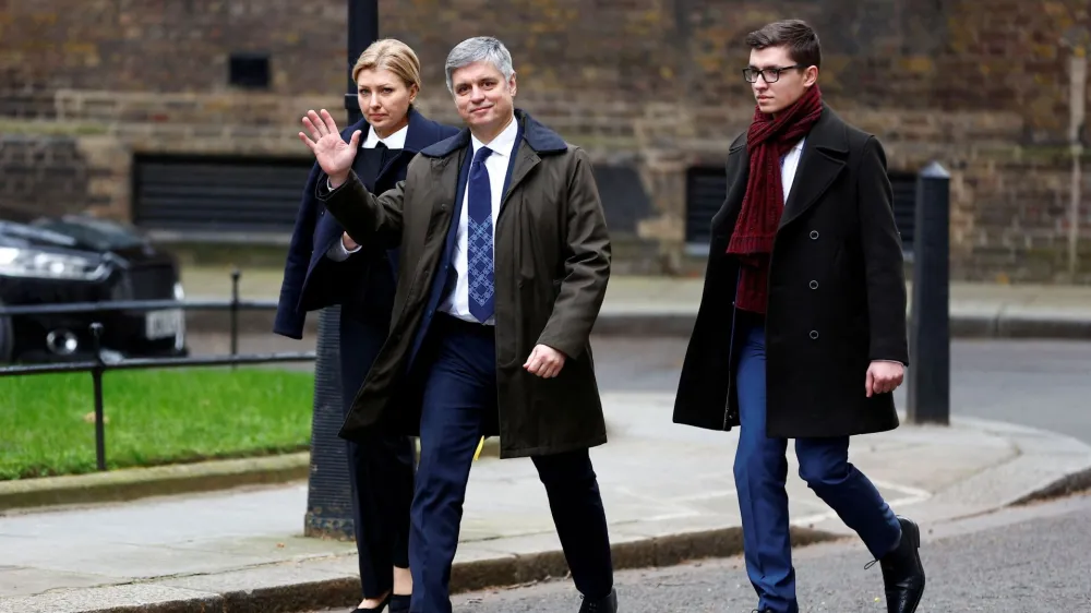 FILE PHOTO: Vadym Prystaiko, who has been dismissed as Ukraine's ambassador to Britain, waves as he and his wife Inna Prystaiko walk outside Number 10 Downing Street on the first anniversary of Russia's full-scale invasion of Ukraine, in London, Britain, February 24, 2023. REUTERS/Peter Nicholls/File Photo