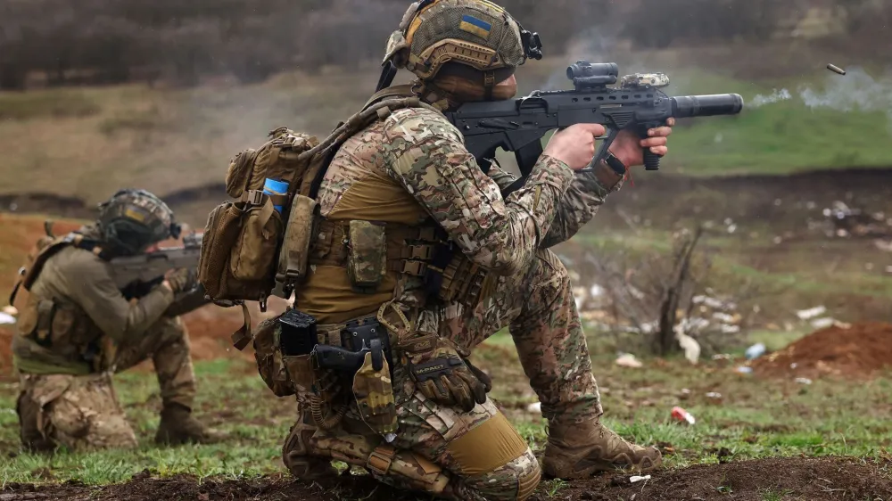 Members of Ukrainian special forces engage in zeroing their weapons prior to a mission, amid Russia?s attack on Ukraine, in the region of Bakhmut, Ukraine, April 6, 2023. REUTERS/Kai Pfaffenbach