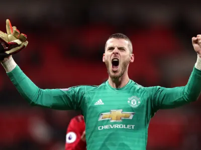 ﻿FILED - 13 January 2019, England, London: Manchester United goalkeeper David de Gea celebrates victory after the final whistle of the English Premier League soccer match between Tottenham Hotspur and Manchester United at Wembley Stadium. David de Gea signed a new contract Monday, tying him to the Premier League until at least 2023, with an option for an extra year. Photo: John Walton/PA Wire/dpa