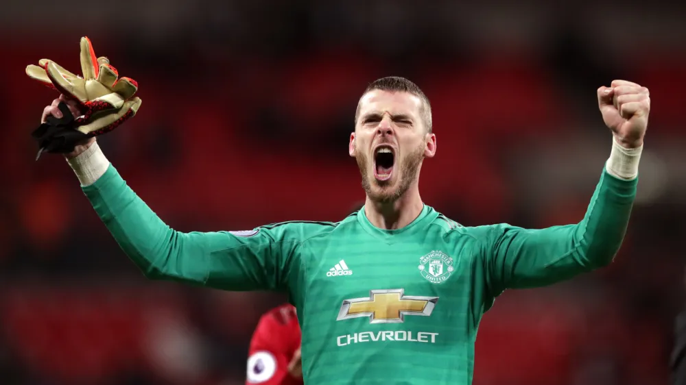 ﻿FILED - 13 January 2019, England, London: Manchester United goalkeeper David de Gea celebrates victory after the final whistle of the English Premier League soccer match between Tottenham Hotspur and Manchester United at Wembley Stadium. David de Gea signed a new contract Monday, tying him to the Premier League until at least 2023, with an option for an extra year. Photo: John Walton/PA Wire/dpa