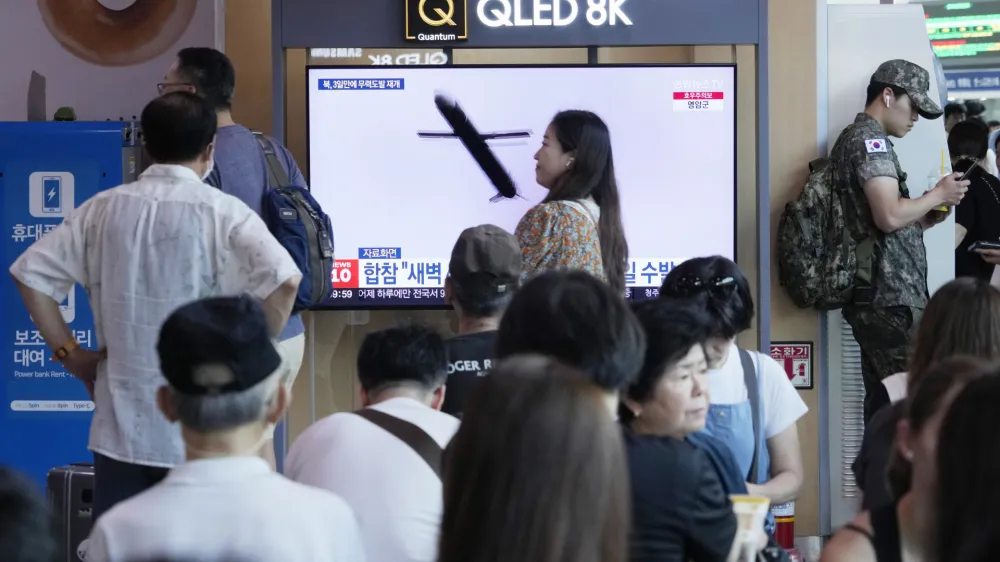 A TV screen shows a file image of North Korea's missile launch during a news program at the Seoul Railway Station in Seoul, South Korea, Saturday, July 22, 2023. North Korea fired several cruise missiles toward its western sea Saturday, South Korea's military said, marking the second launch event this week apparently in protest of the docking of a nuclear-armed U.S. submarine in South Korea. (AP Photo/Ahn Young-joon)