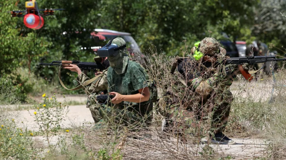 Members of a Russian territorial defence female unit operate FPV drones and practise battle tactics while training at a firing ground near Yevpatoriya, Crimea, July 22, 2023. REUTERS/Alexey Pavlishak