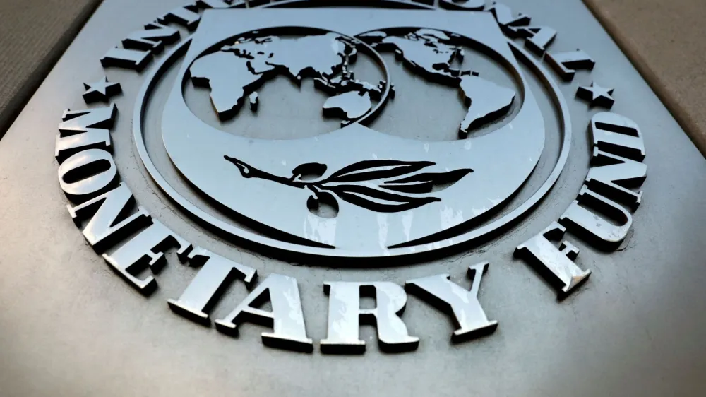 FILE PHOTO: The International Monetary Fund (IMF) logo is seen outside the headquarters building in Washington, U.S., September 4, 2018. REUTERS/Yuri Gripas/File Photo