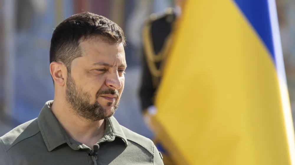 In this photo provided by the Ukrainian Presidential Press Office, Ukrainian President Volodymyr Zelenskyy attends an event for marking Statehood Day in Mykhailivska Square in Kyiv, Friday, July 28, 2023. (Ukrainian Presidential Press Office via AP)