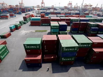 FILE PHOTO: Shipping containers are seen at a port in Hai Phong city, Vietnam July 12, 2018. REUTERS/Kham/File Photo