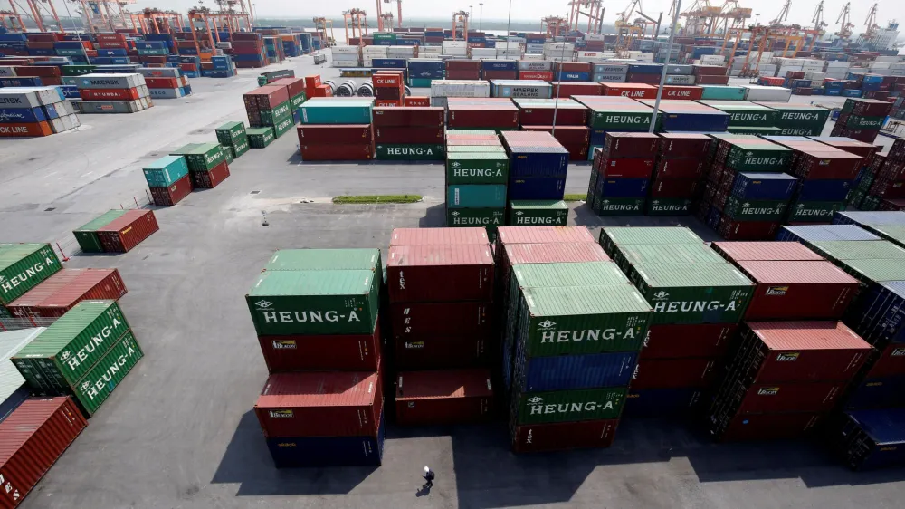 FILE PHOTO: Shipping containers are seen at a port in Hai Phong city, Vietnam July 12, 2018. REUTERS/Kham/File Photo