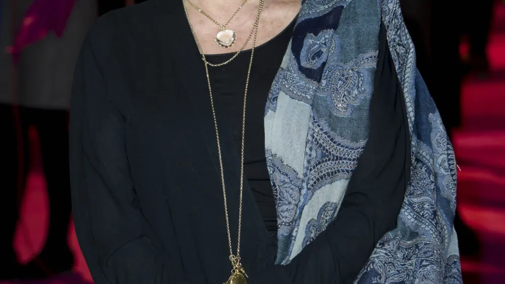 British actress, Judi Dench, arrives for 'The Best Exotic Marigold Hotel' world premiere at a central London venue, Tuesday, Feb. 7, 2012. (AP Photo/Jonathan Short)