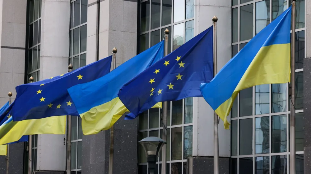 FILE PHOTO: Flags of Ukraine fly in front of the EU Parliament building on the first anniversary of the Russian invasion, in Brussels, Belgium, February 24, 2023. REUTERS/Yves Herman/File Photo