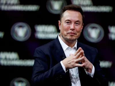 FILE PHOTO: Chief Executive Officer of SpaceX and Tesla and owner of Twitter, gestures as he attends the Viva Technology conference dedicated to innovation and startups at the Porte de Versailles exhibition centre in Paris, France, June 16, 2023. REUTERS/Gonzalo Fuentes/File Photo