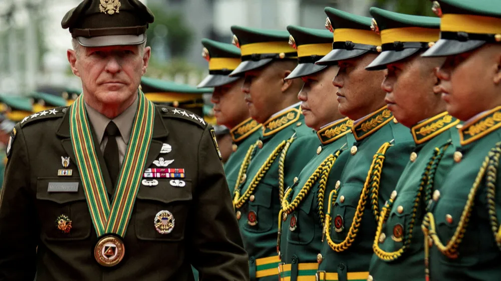 FILE PHOTO: U.S. Army Chief of Staff Gen. James McConville walks past honor guards during arrival honors at Fort Bonifacio, Taguig, Philippines, May 10, 2023. REUTER/Eloisa Lopez  TPX IMAGES OF THE DAY/File Photo