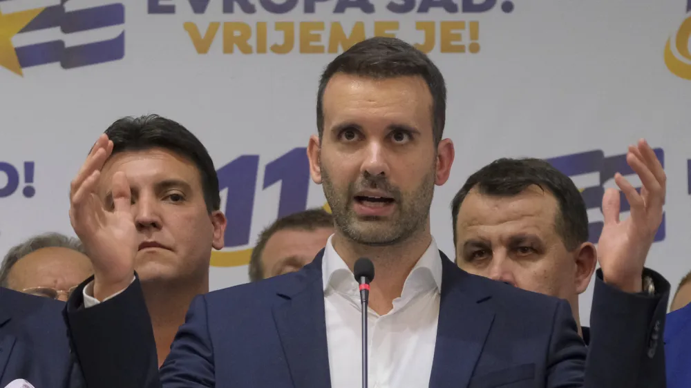 Milojko Spajic, president of the centrist Europe Now party speaks at his headquarters after parliamentary election in Montenegro's capital Podgorica, Sunday, June 11, 2023. A recently formed centrist group that advocates Montenegro joining the European Union was projected to win the small Balkan country's early parliamentary election Sunday, but without enough support to form a government on its own, according to independent vote monitors. (AP Photo/Risto Bozovic)