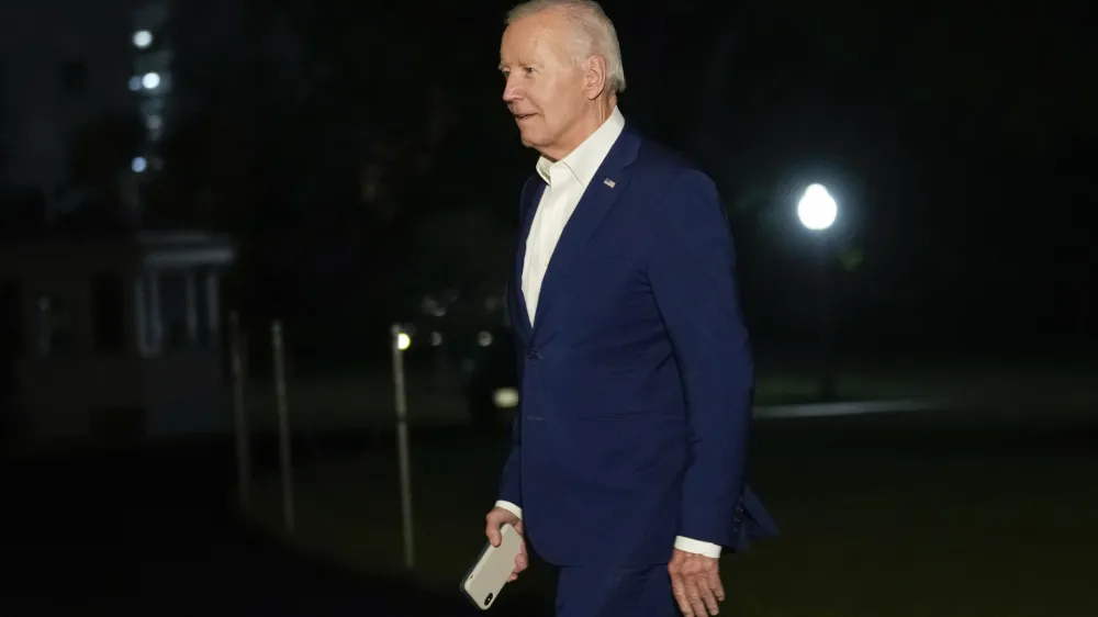 President Joe Biden walks across the South Lawn of the White House in Washington, Thursday, Aug. 10, 2023, after returning from a 4-day trip to Arizona, New Mexico and Utah. (AP Photo/Susan Walsh)