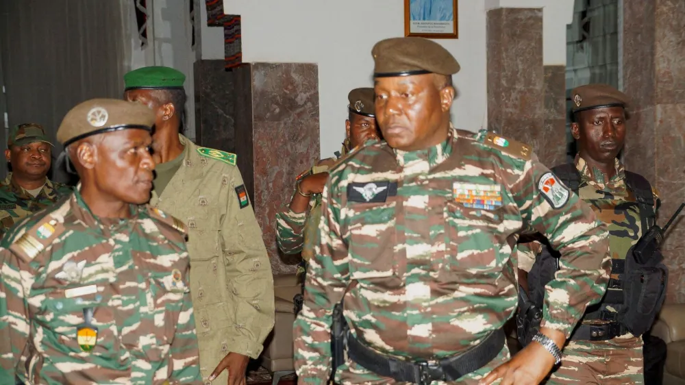 FILE PHOTO: FILE PHOTO: General Abdourahmane Tiani, who was declared as the new head of state of Niger by leaders of a coup, arrives to meet with ministers in Niamey, Niger July 28, 2023. REUTERS/Balima Boureima/File Photo/File Photo