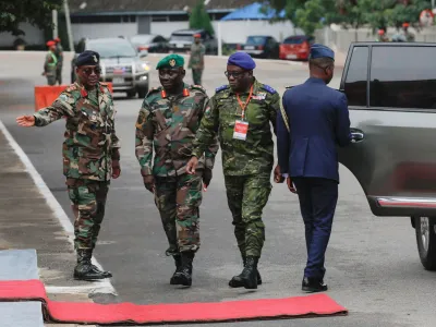 Military personnel arrive at the headquarters of the Ghana Armed Forces as the ECOWAS Committee of Chiefs of Defense staff meet on the deployment of its standby force in the Republic of Niger, in Accra, Ghana. August 17, 2023. REUTERS/Francis Kokoroko