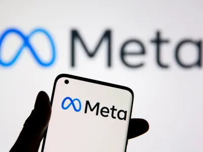 FILE PHOTO: A smartphone with Meta logo is seen in front of displayed Facebook's new rebrand logo Meta in this illustration taken, October 28, 2021. REUTERS/Dado Ruvic/Illustration/File Photo