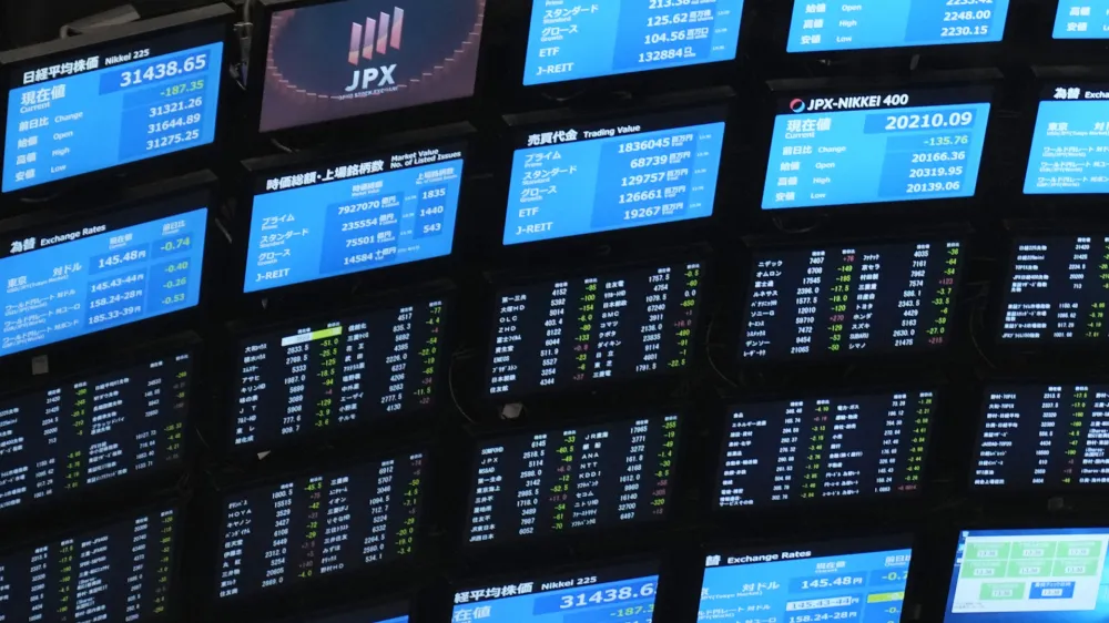 Electronic stock boards are seen at Tokyo Stock Exchange Friday, Aug. 18, 2023 in Tokyo, Japan. Asian shares mostly rose Thursday, Aug. 24, after Wall Street rallied to its best day since June after pressures from the bond market relaxed a bit. (AP Photo/Shuji Kajiyama)
