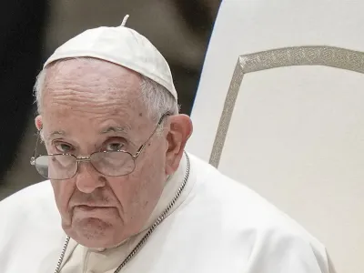 FILE - Pope Francis attends his weekly general audience in the Pope Paul VI hall at the Vatican, Wednesday, Aug. 23, 2023. Pope Francis in a speech to Catholic lawmakers has warned against social media reducing human relationships to "mere algorithms" and urged lawmakers to be vigilant against "partisan" propaganda and divisiveness on social media. In his speech on Saturday, Aug. 26, 2023 he said social media networks can help people realize they are part of something larger than themselves. (AP Photo/Andrew Medichini, File)