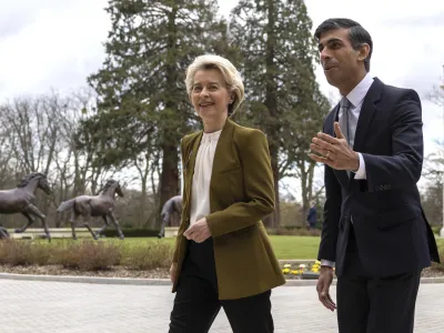 Britain's Prime Minister Rishi Sunak, right, greets European Commission President Ursula von der Leyen at the Fairmont Hotel in Windsor, England, Monday Feb. 27, 2023. The U.K. and the European Union were poised Monday to end years of wrangling and seal a deal to resolve their thorny post-Brexit trade dispute over Northern Ireland. Striking an agreement at a meeting with European Commission President Ursula von der Leyen would be a big victory for Prime Minister Rishi Sunak — but not the end of his troubles. (Dan Kitwood/Pool via AP)