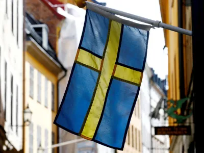 FILE PHOTO: The Swedish flag is seen at Gamla Stan, the Old City of Stockholm, Sweden, May 7, 2017. REUTERS/Ints Kalnins/File Photo