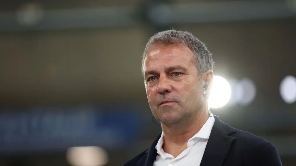 FILE PHOTO: Soccer Football - International Friendly - Germany v Colombia - Veltins-Arena, Gelsenkirchen, Germany - June 20, 2023 Germany coach Hansi Flick looks dejected after the match REUTERS/Thilo Schmuelgen/File Photo