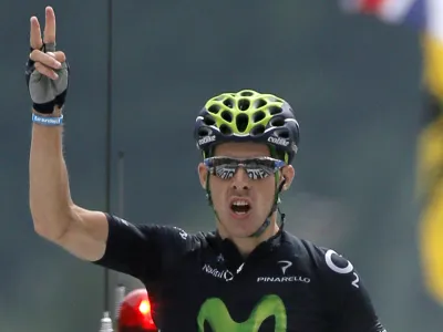 ﻿Rui Alberto Costa of Portugal crosses the finish line to win the nineteenth stage of the Tour de France cycling race over 204.5 kilometers (127.8 miles) with start in in Bourg-d'Oisans and finish in Le Grand-Bornand, France, Friday July 19 2013. (AP Photo/Laurent Rebours)