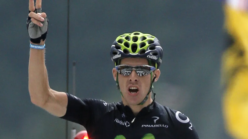 ﻿Rui Alberto Costa of Portugal crosses the finish line to win the nineteenth stage of the Tour de France cycling race over 204.5 kilometers (127.8 miles) with start in in Bourg-d'Oisans and finish in Le Grand-Bornand, France, Friday July 19 2013. (AP Photo/Laurent Rebours)