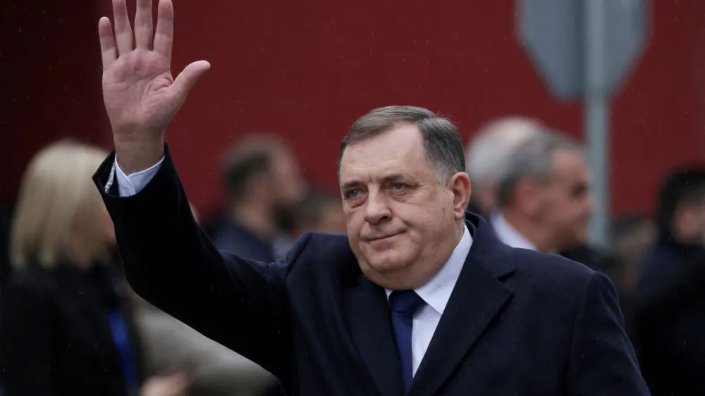 FILE PHOTO: President of Republika Srpska (Serb Republic) Milorad Dodik waves as he attends Serb Republic national holiday, banned by the constitutional court, in East Sarajevo, Bosnia and Herzegovina, January 9, 2023. REUTERS/Dado Ruvic/File Photo