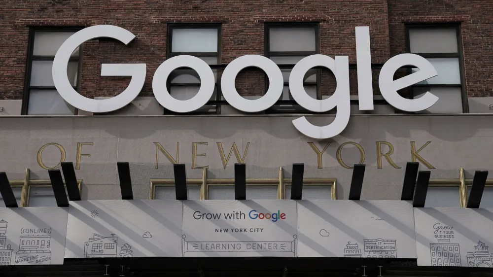 FILE PHOTO: A Google sign is pictured on a Google building in the Manhattan borough of New York City, New York, U.S., October 20, 2020. REUTERS/Carlo Allegri/File Photo