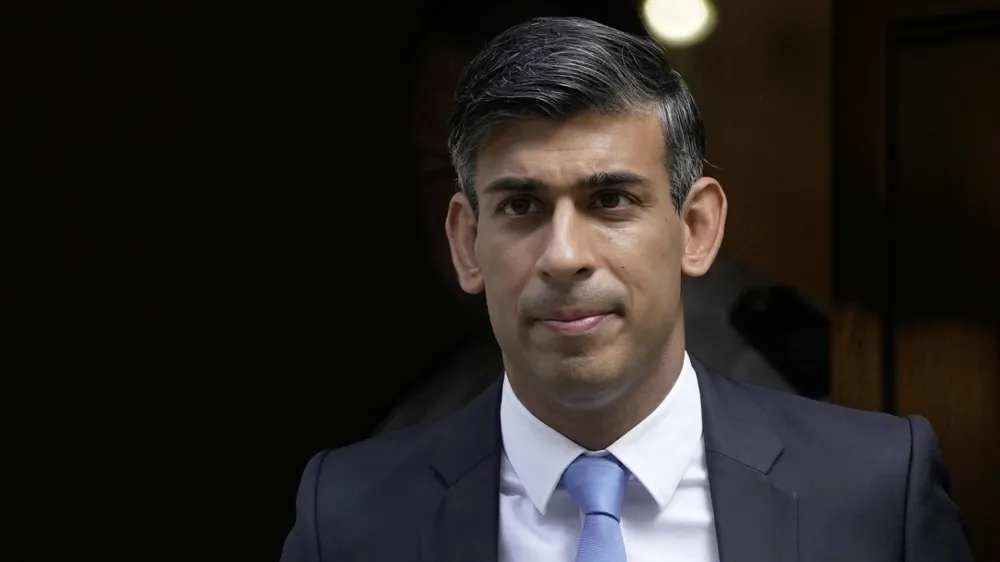 FILE - Britain's Prime Minister Rishi Sunak leaves 10 Downing Street to go to the House of Commons for his weekly Prime Minister's Questions in London, Wednesday, Sept. 6, 2023. Sunak has described American XL Bully dogs as a "danger to our communities" and announced plans to ban them following a public outcry after a series of recent attacks. (AP Photo/Kin Cheung, File)