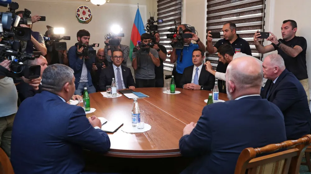 Azerbaijani representatives and members of the delegation of ethnic Armenians from Nagorno-Karabakh attend the talks in the town of Yevlakh, Azerbaijan September 21, 2023. REUTERS/Stringer NO RESALES. NO ARCHIVES