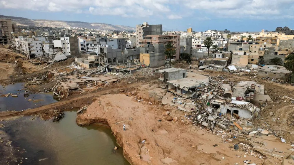 An aerial view shows destroyed buildings and houses in the aftermath of a deadly storm and flooding that hit Libya, in Derna, Libya September 20, 2023. REUTERS/Zohra Bensemra