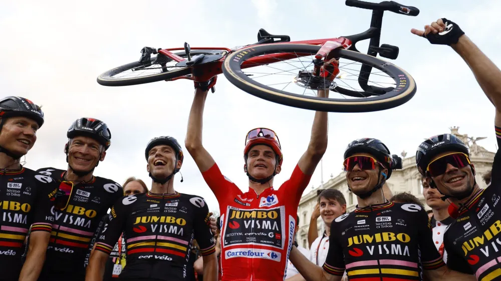 Cycling - Vuelta a Espana - Stage 21 - Hipodromo de la Zarzuela to Madrid - Spain - September 17, 2023 Team Jumbo&ndash;Visma's Sepp Kuss celebrates with teammates after winning Vuelta a Espana REUTERS/Susana Vera