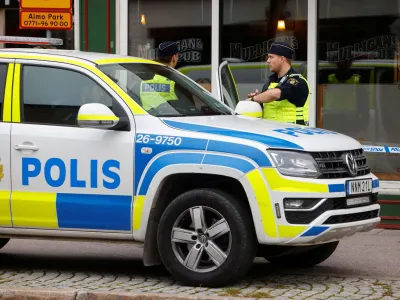 Police officers secure the area outside of a restaurant following a shooting in Sandviken, eastern Sweden September 22, 2023.  TT News Agency/Henrik Hansson via REUTERS   ATTENTION EDITORS - THIS IMAGE WAS PROVIDED BY A THIRD PARTY. SWEDEN OUT. NO COMMERCIAL OR EDITORIAL SALES IN SWEDEN.