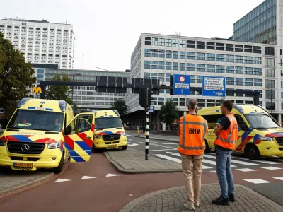 Ambulances are seen after Dutch police arrested a suspect after a shooting in Rotterdam, Netherlands, September 28, 2023. REUTERS/Piroschka van de Wouw