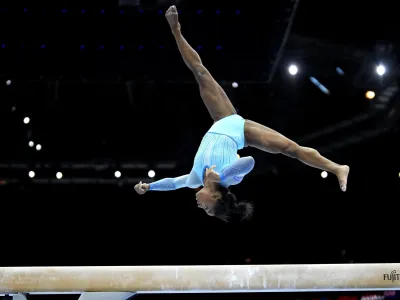 United States' Simone Biles competes on the beam during Women's Qualifications at the Artistic Gymnastics World Championships in Antwerp, Belgium, Sunday, Oct.1, 2023. The event will take place until Sunday, Oct. 8. (AP Photo/Virginia Mayo)