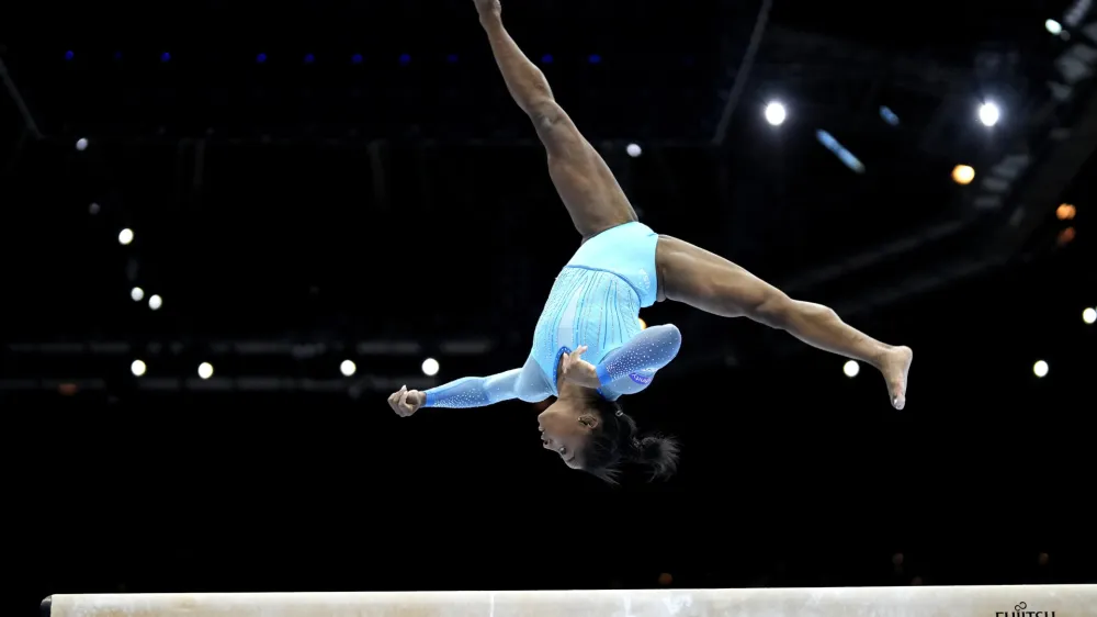 United States' Simone Biles competes on the beam during Women's Qualifications at the Artistic Gymnastics World Championships in Antwerp, Belgium, Sunday, Oct.1, 2023. The event will take place until Sunday, Oct. 8. (AP Photo/Virginia Mayo)