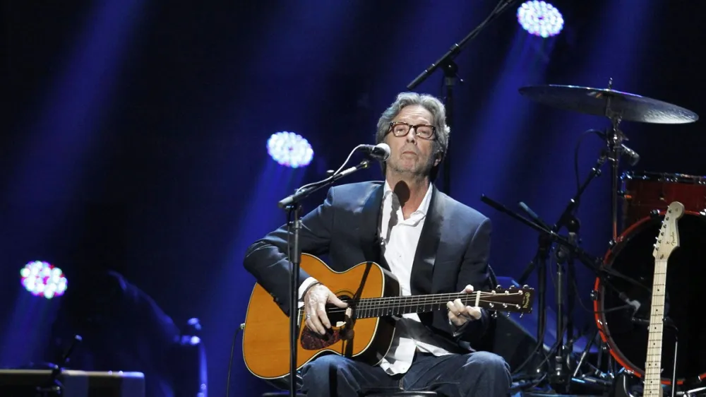 ﻿70 let<br>Legendarni glasbenik Eric Patrick Clapton<br>Perfekcionist in še več<br>Na kitari je igral tako, da so ga že pri 21-tih imenovali Bog <br>