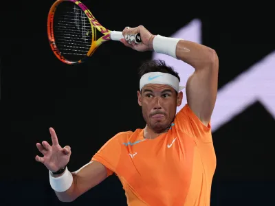 FILE PHOTO: Tennis - Australian Open - Melbourne Park, Melbourne, Australia - January 18, 2023 Spain's Rafael Nadal in action during his second round match against Mackenzie Mcdonald of the U.S. REUTERS/Loren Elliott/File Photo