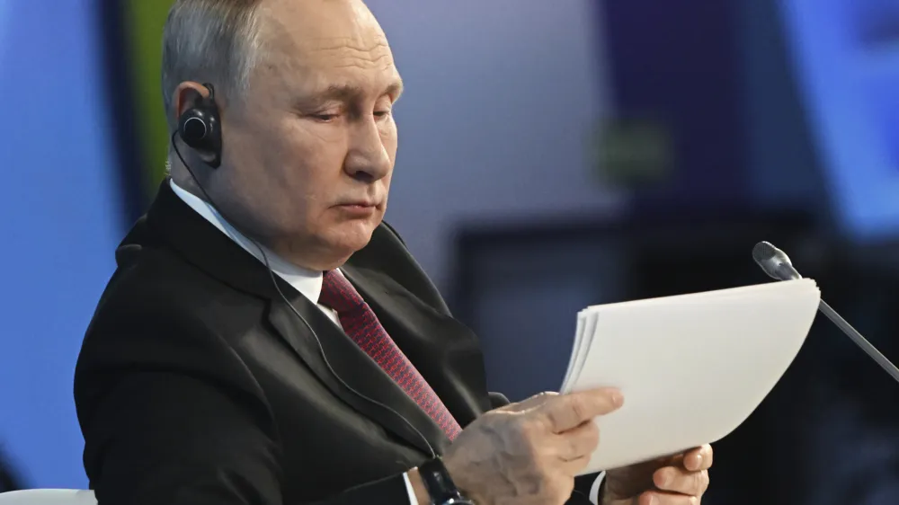 Russian President Vladimir Putin attends a plenary session at the 2023 Russian Energy Week international forum at the Manezh Central Exhibition Hall in Moscow, Russia, Wednesday, Oct. 11, 2023. (Kristina Kormilitsyna, Sputnik, Kremlin Pool Photo via AP)