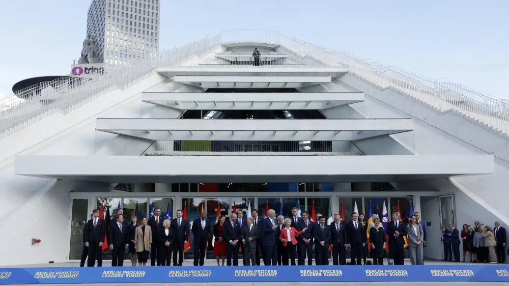 Leaders from EU and Western Balkans countries stand for a family photo in front of Pyramid Hall after Berlin Process Leaders' Summit in Tirana, Albania, Monday, Oct. 16, 2023. Leaders from the European Union and the Western Balkans hold a summit in Albania's capital to discuss the path to membership in the bloc for the six countries of the region. (AP Photo/Franc Zhurda)